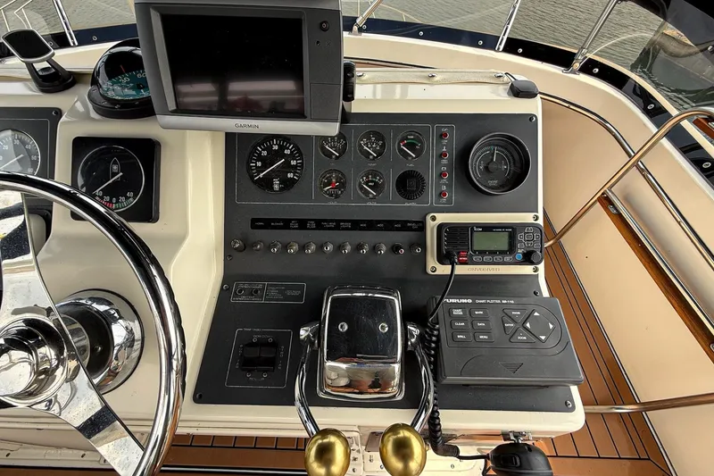 Slide: The Image of Control panel of a 1989 Tiara Yachts 3600 Convertible with navigation instruments. - 22