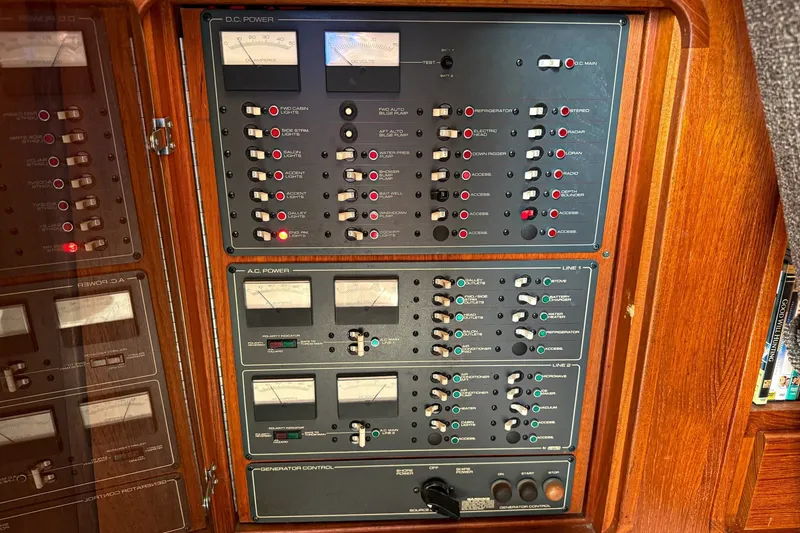 Slide: The Image of Electrical control panel on a 1989 Tiara Yachts 3600 Convertible boat. - 28
