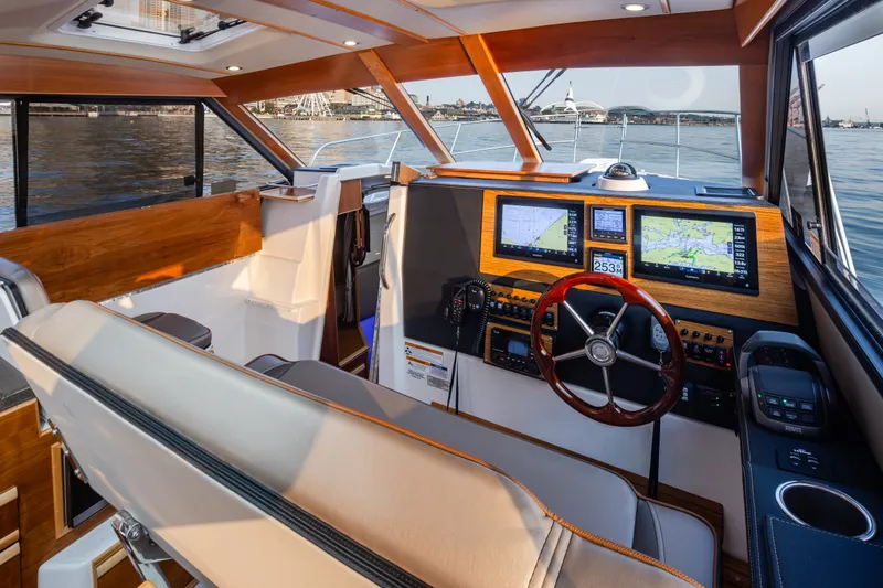 Slide: The Image of Interior of 2023 Cutwater C-30 Sedan boat with modern navigation equipment. - 33