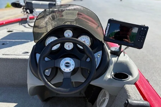Slide: The Image of Steering console of 2012 TRACKER BOATS Pro Team 175 with gauges and Lowrance fishfinder. - 47