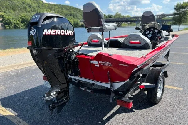 Slide: The Image of 2012 TRACKER BOATS Pro Team 175 with Mercury engine, parked by a scenic lake. - 62
