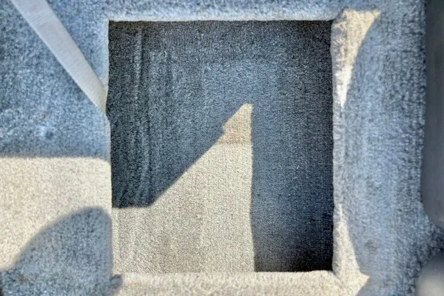 Slide: The Image of Carpeted storage compartment on a 2012 TRACKER BOATS Pro Team 175. - 28