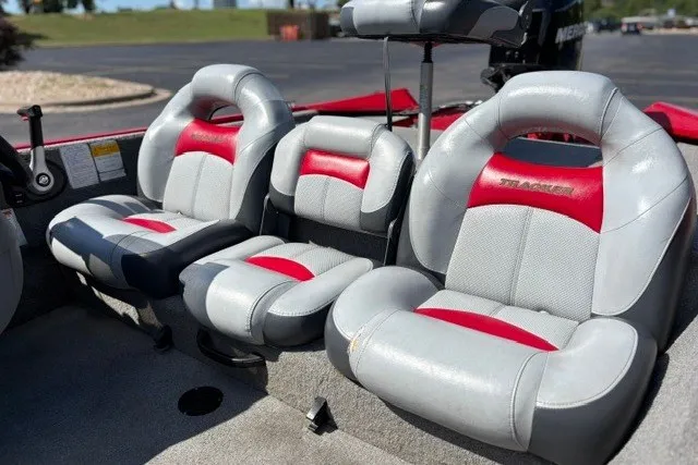 Slide: The Image of 2012 TRACKER BOATS Pro Team 175 interior with gray and red seating. - 65