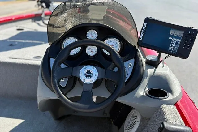 Slide: The Image of Steering console of 2012 TRACKER BOATS Pro Team 175 with gauges and Lowrance fishfinder. - 15