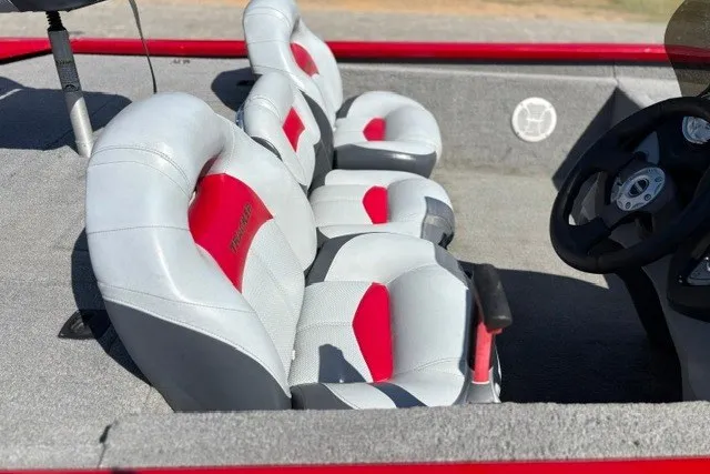 Slide: The Image of 2012 TRACKER BOATS Pro Team 175 interior with gray and red seating. - 66