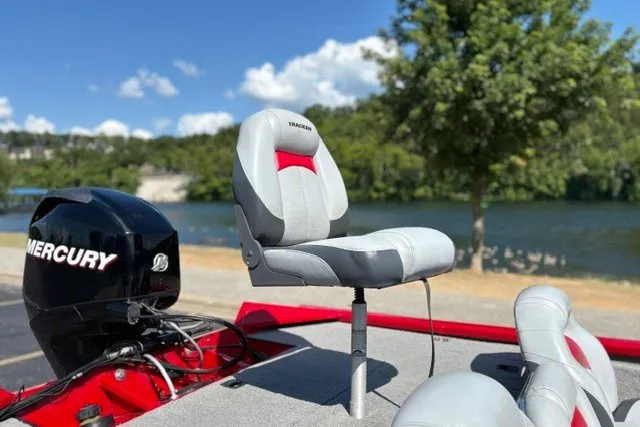 Slide: The Image of 2012 TRACKER BOATS Pro Team 175 with Mercury engine, parked by a scenic lake. - 56