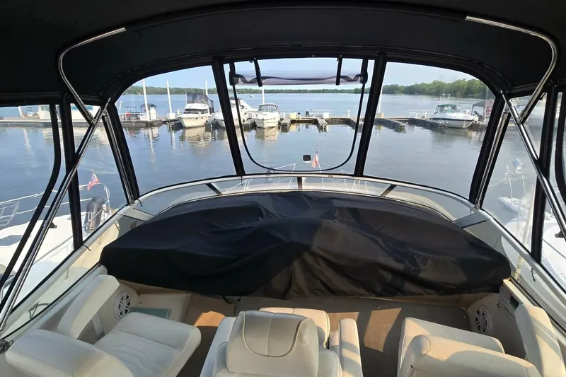 Slide: The Image of Interior view of 2002 Carver 410 Sport Sedan yacht at marina. - 18