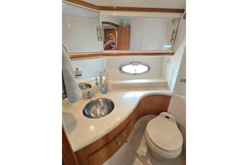 Slide: The Image of Luxurious bathroom in 2002 Carver 410 Sport Sedan yacht with modern fixtures. - 14