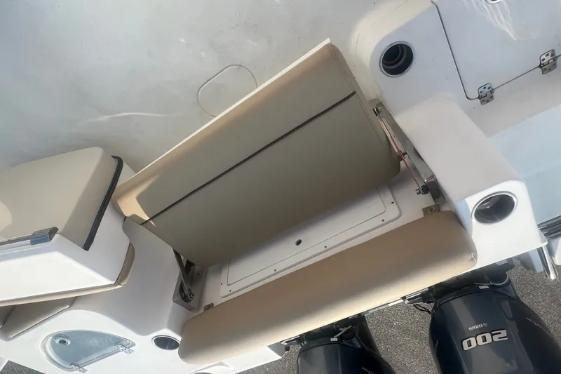 Slide: The Image of 2017 Sportsman Open 282 Center Console boat with seating and dual Yamaha 200 engines. - 23