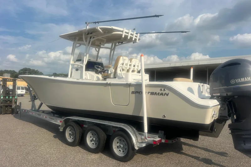 Slide: The Image of 2017 Sportsman Open 282 Center Console boat on trailer with Yamaha engine. - 16