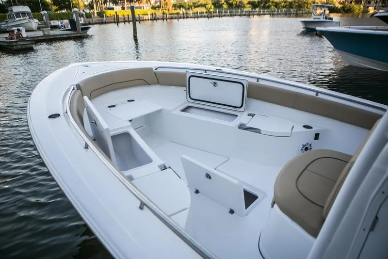 Slide: The Image of Manufacturer Provided Image: 2017 Sportsman Open 282 Center Console boat interior at a marina. - 7