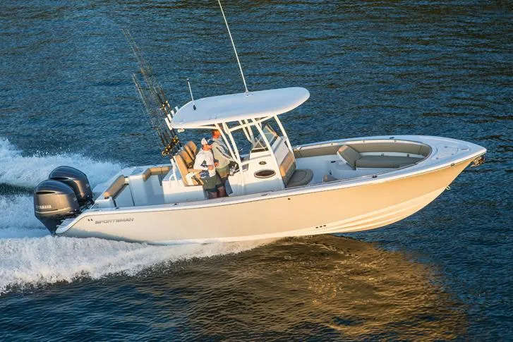 Slide: The Image of Manufacturer Provided Image: 2017 Sportsman Open 282 Center Console boat cruising on water. - 4