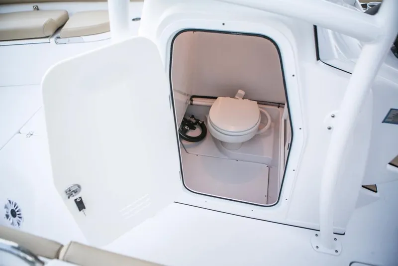 Slide: The Image of Manufacturer Provided Image: 2017 Sportsman Open 282 Center Console boat with onboard toilet. - 10