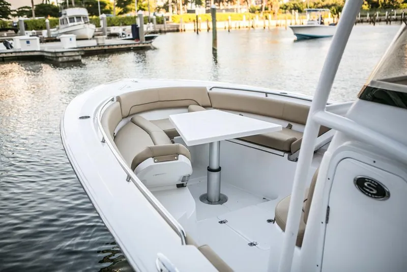 Slide: The Image of Manufacturer Provided Image: 2017 Sportsman Open 282 Center Console boat with seating and table. - 6