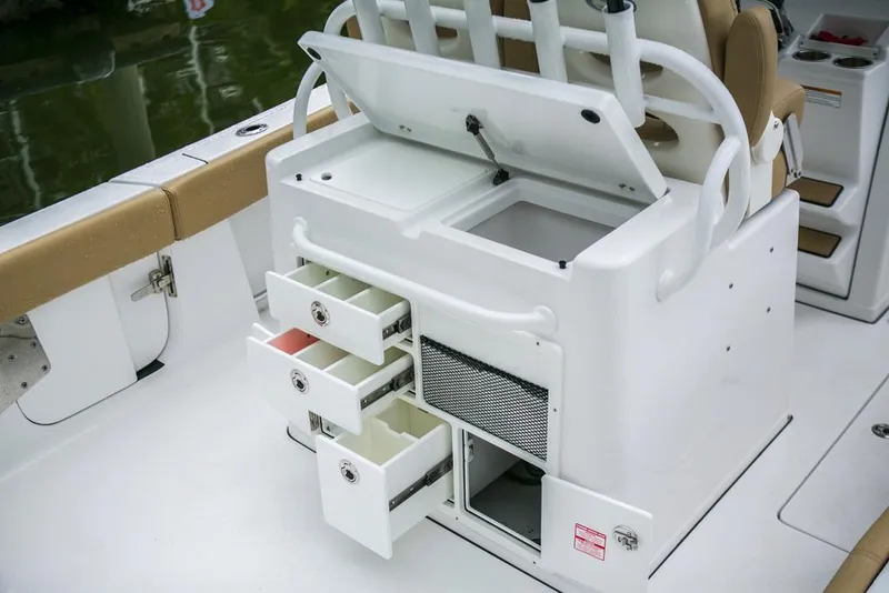 Slide: The Image of Manufacturer Provided Image: 2017 Sportsman Open 282 Center Console boat with open storage compartments. - 11