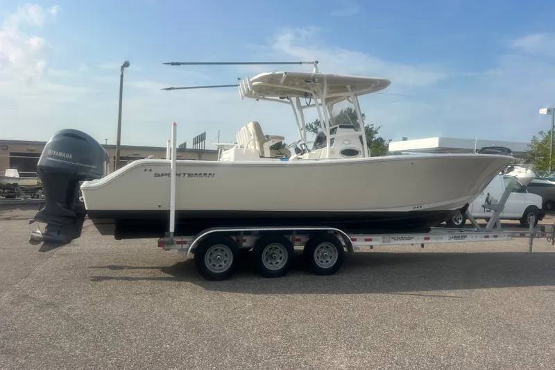 Slide: The Image of 2017 Sportsman Open 282 Center Console boat on trailer, featuring Yamaha outboard motor. - 0