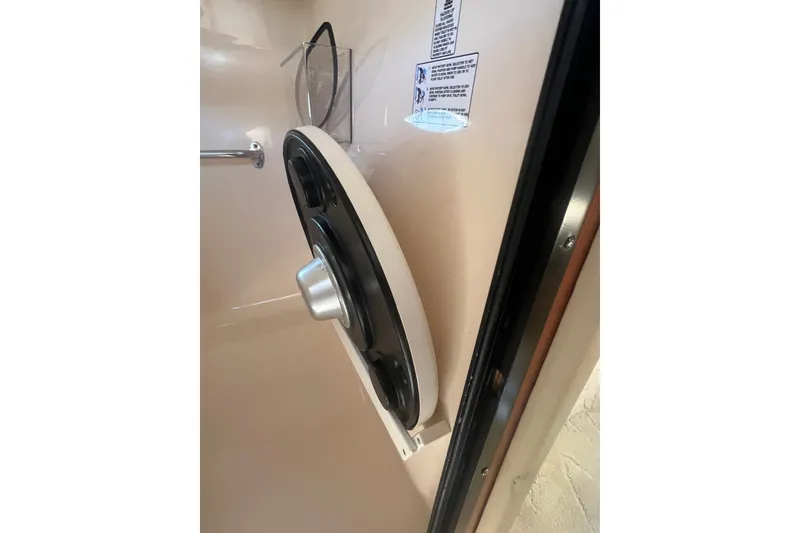 Slide: The Image of 2004 Rinker 282 Captiva Bowrider interior detail with mounted speaker. - 44
