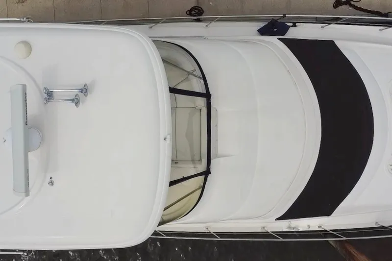 Slide: The Image of Top view of a 2006 Sea Ray 550 Sedan Bridge yacht docked. - 9