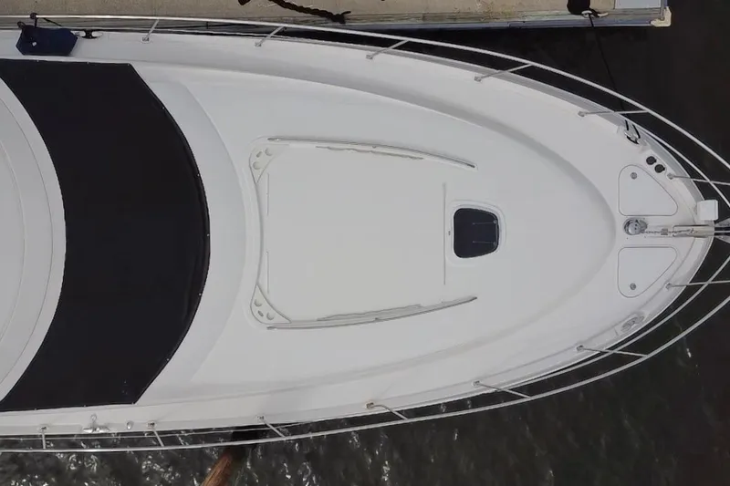 Slide: The Image of Top view of a 2006 Sea Ray 550 Sedan Bridge yacht docked at a marina. - 8