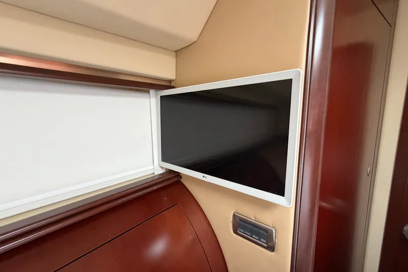 Slide: The Image of Flat-screen TV in 2006 Sea Ray 550 Sedan Bridge yacht interior. - 132