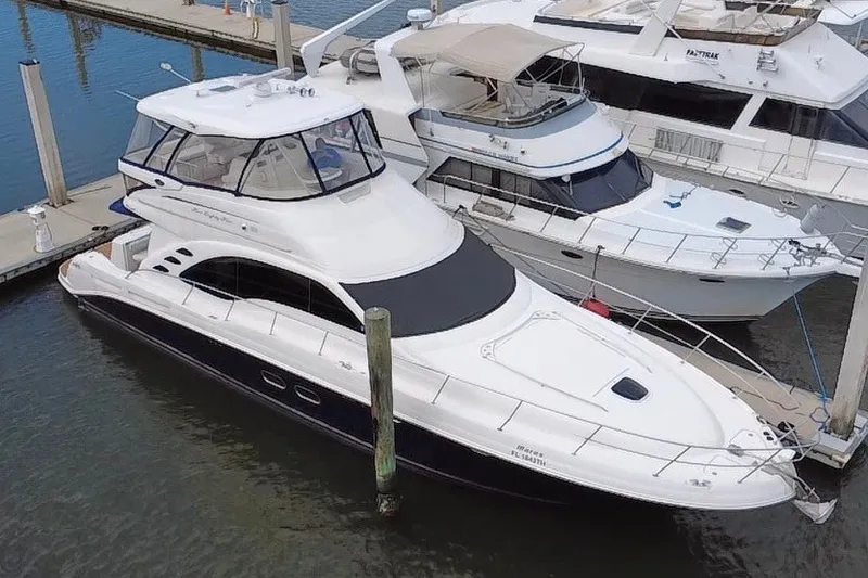 The Image of 2006 Sea Ray 550 Sedan Bridge yacht docked at marina. - 0