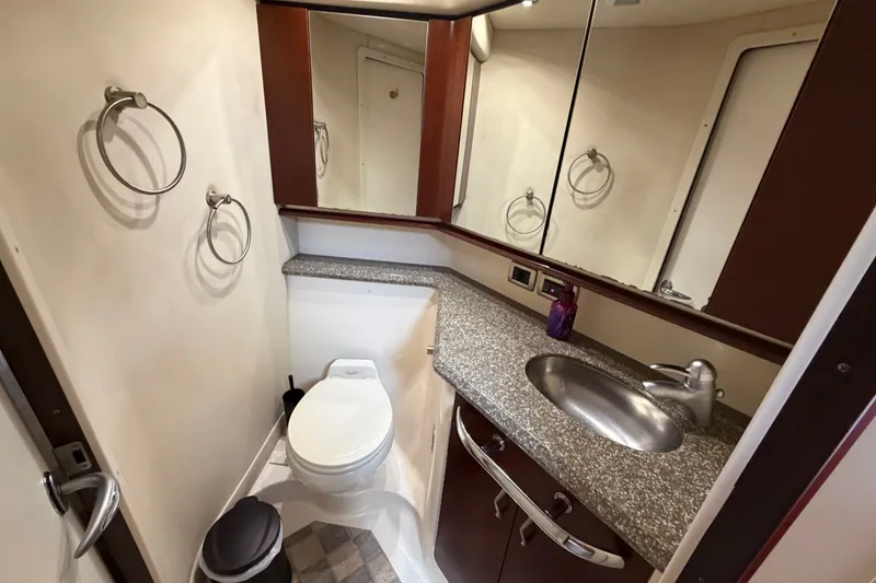 Slide: The Image of Luxurious bathroom in 2006 Sea Ray 550 Sedan Bridge yacht with modern fixtures. - 138