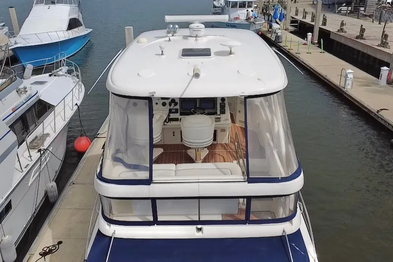 Slide: The Image of 2006 Sea Ray 550 Sedan Bridge yacht docked at marina, aerial view. - 21