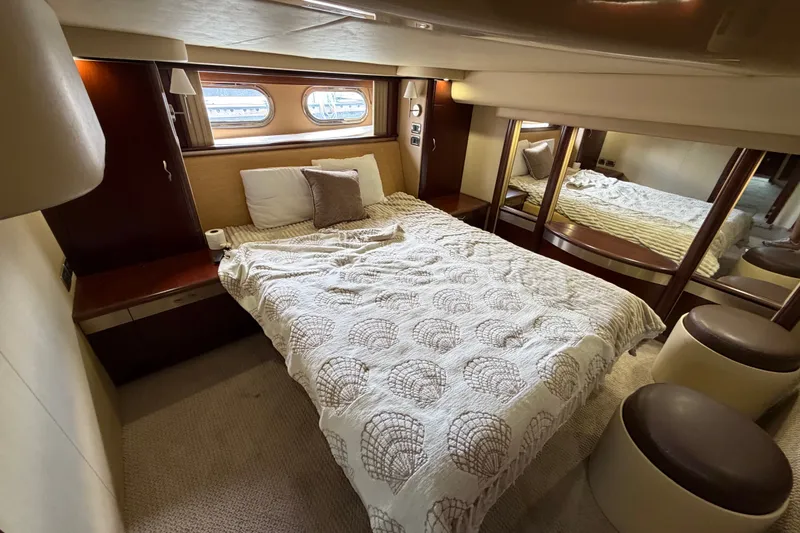 Slide: The Image of Luxurious bedroom interior of 2006 Sea Ray 550 Sedan Bridge yacht. - 114