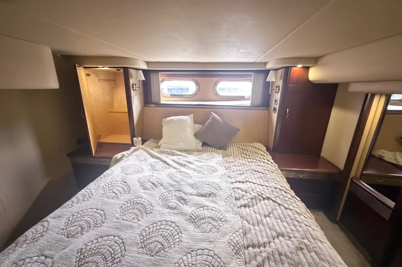 Slide: The Image of Luxurious bedroom interior of 2006 Sea Ray 550 Sedan Bridge yacht. - 91
