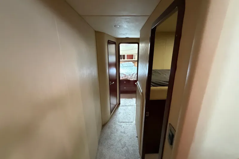 Slide: The Image of Interior hallway of 2006 Sea Ray 550 Sedan Bridge yacht, leading to bedrooms. - 125