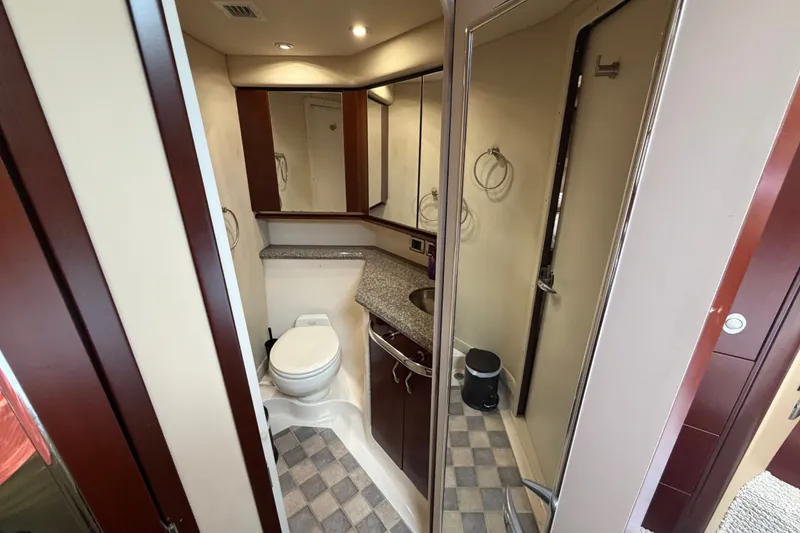 Slide: The Image of Luxurious bathroom in 2006 Sea Ray 550 Sedan Bridge yacht with modern amenities. - 137