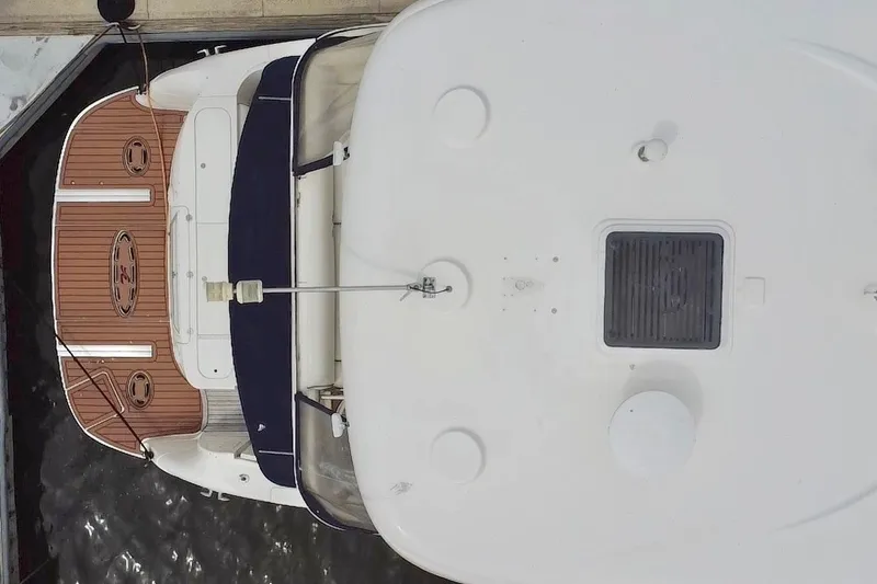 Slide: The Image of Top view of a 2006 Sea Ray 550 Sedan Bridge yacht docked at a marina. - 10