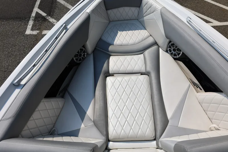 Slide: The Image of Luxurious interior of a 2013 Tigé Z3 boat with diamond-stitched upholstery. - 47