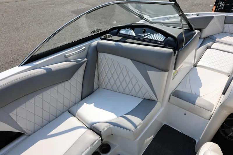 Slide: The Image of 2013 Tigé Z3 boat interior with white and gray quilted seating. - 26
