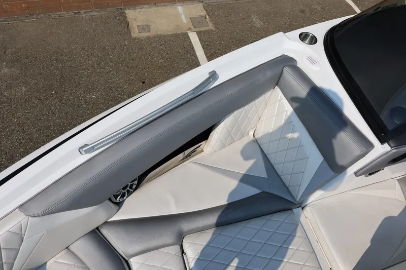 Slide: The Image of 2013 Tigé Z3 boat interior with white and gray quilted seating. - 51