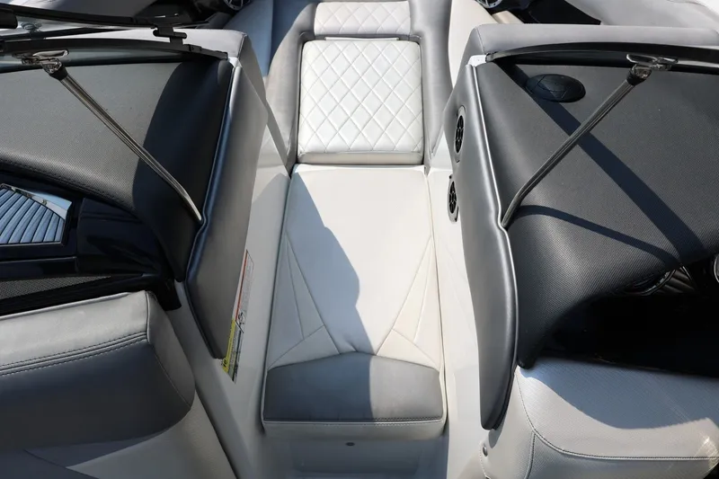 Slide: The Image of Interior of a 2013 Tigé Z3 boat featuring sleek seating and modern design. - 45