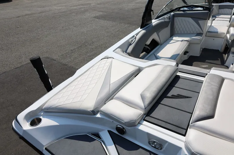 Slide: The Image of 2013 Tigé Z3 boat interior with luxurious seating and sleek design. - 16
