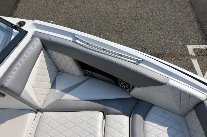 Slide: The Image of 2013 Tigé Z3 boat interior with quilted gray and white seating. - 50