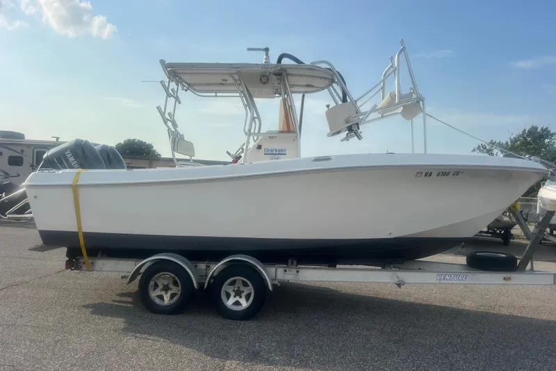 Slide: The Image of 2007 Clearwater 2300 Center Console boat on trailer, side view. - 2