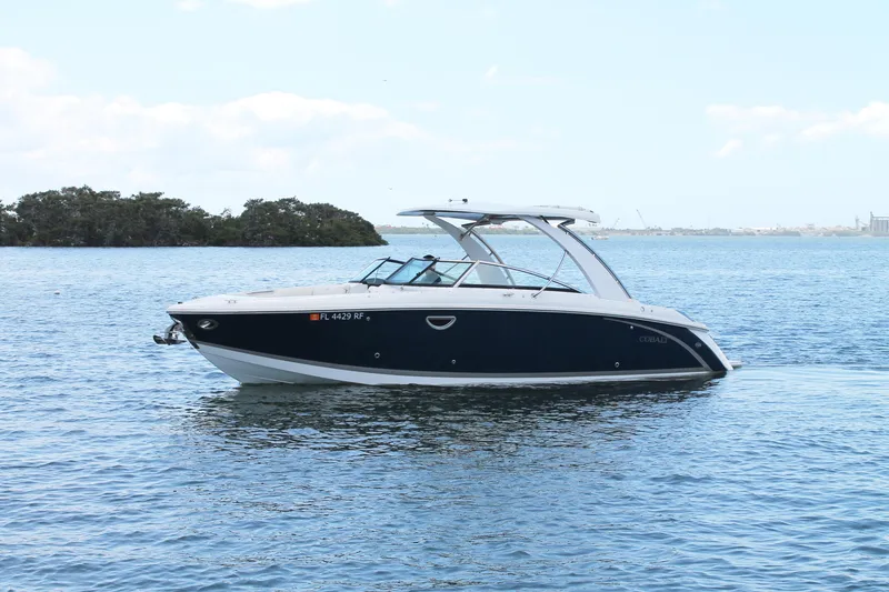Slide: The Image of 2017 Cobalt R30 boat on calm water with distant shoreline. - 6
