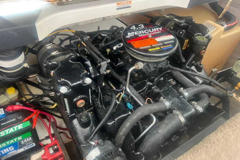 Slide: The Image of Engine compartment of a 2002 Chaparral 180 SSe with Mercury MerCruiser 4.3L engine. - 55