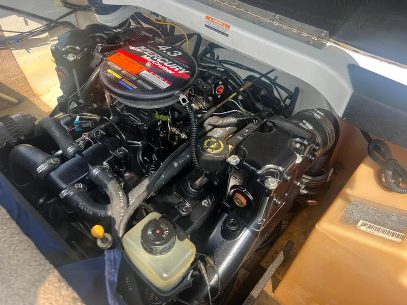 Slide: The Image of A 4.3-liter MerCruiser engine in a 2002 Chaparral 180 SSe boat. - 26