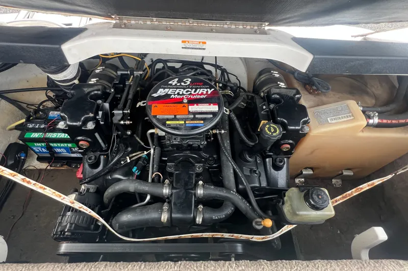 Slide: The Image of Engine compartment of a 2002 Chaparral 180 SSe with a Mercury MerCruiser 4.3L engine. - 49