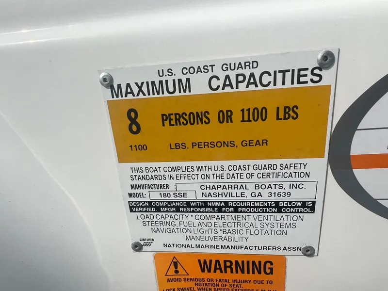 Slide: The Image of Sign shows maximum capacity: 8 persons or 1100 lbs for Chaparral 180 SSe, year 2002. - 17
