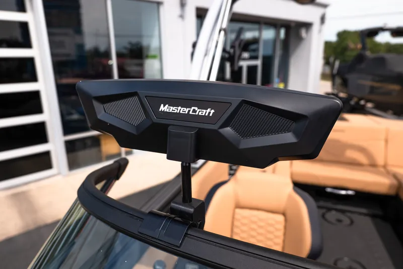 Slide: The Image of 2027 MasterCraft NXT24 boat interior with branded rearview mirror. - 44