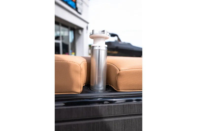 Slide: The Image of 2027 MasterCraft NXT24 boat seat with stainless steel cup holder. - 39