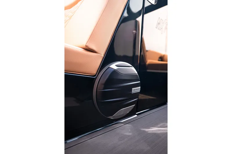 Slide: The Image of 2027 MasterCraft NXT24 boat interior with premium speaker detail. - 31