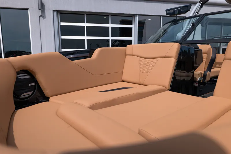 Slide: The Image of Luxurious tan seating on 2027 MasterCraft NXT24 boat, showcasing modern design and comfort. - 15