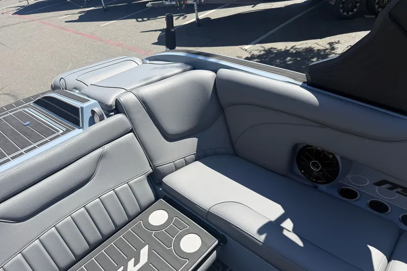 Slide: The Image of Luxurious interior of 2026 MB B52 23 Alpha boat with sleek seating and speaker system. - 21