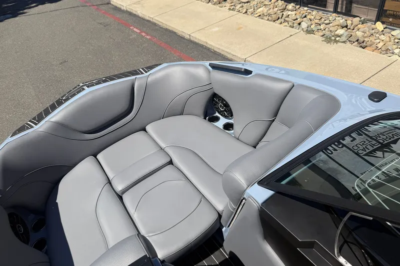 Slide: The Image of Luxurious seating in 2026 MB B52 23 Alpha boat, featuring sleek gray upholstery. - 28